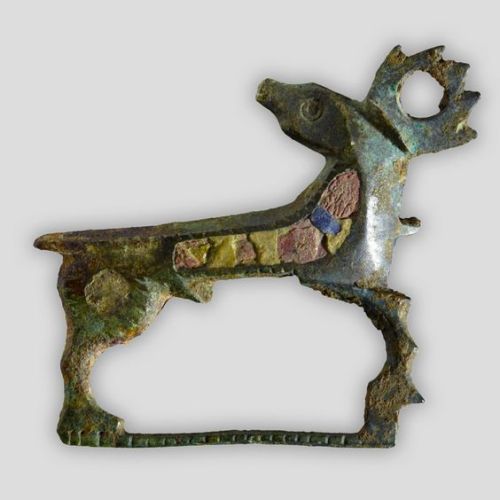 Ashmolean MuseumBronze Roman Stag BroochThis enamelled bronze brooch in the shape of a stag, once de