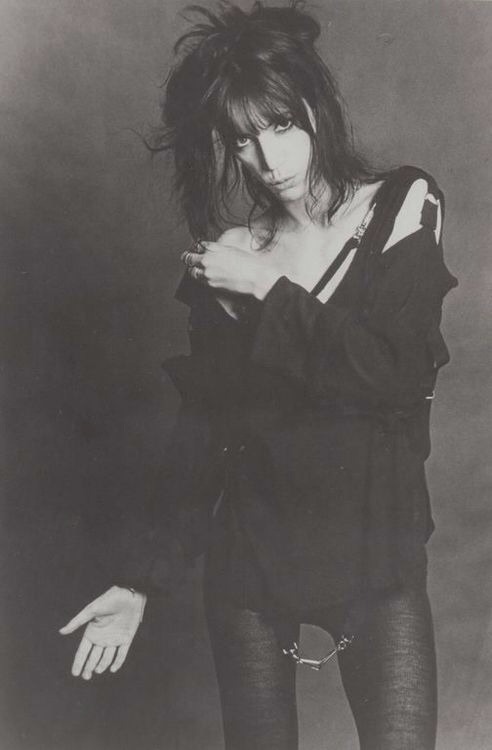 you-belong-among-wildflowers:   1970’s Style Icons : Patti Smith ↳“I know fashion is a material thing but we live in a material world and I love clothes. My style says ‘look at me, don’t look at me.’ I just really don’t care what you
