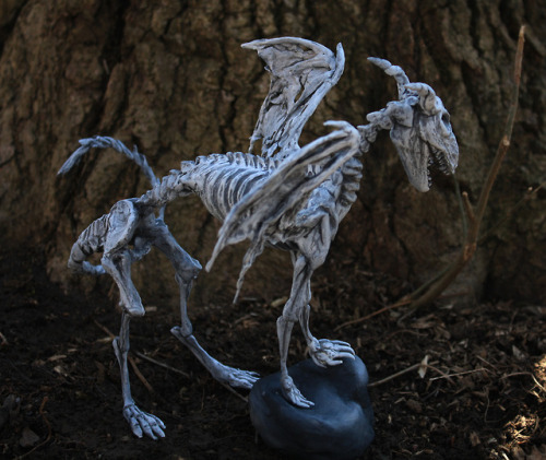 Demon dragon skeleton named Kimaris, a one of a kind polymer clay sculpture. He is for sale on etsy 