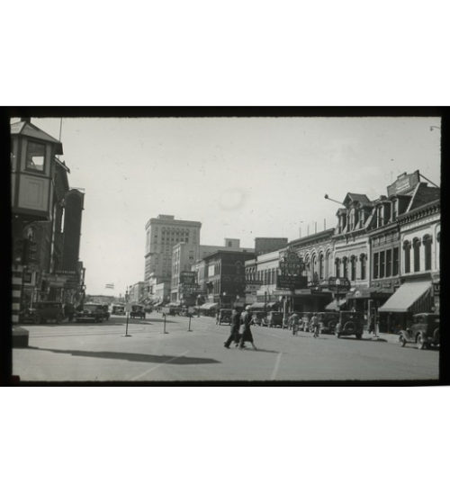 Black and white Lantern slide depicting an image of downtown Saginaw, Michigan, East Genesee Avenue 