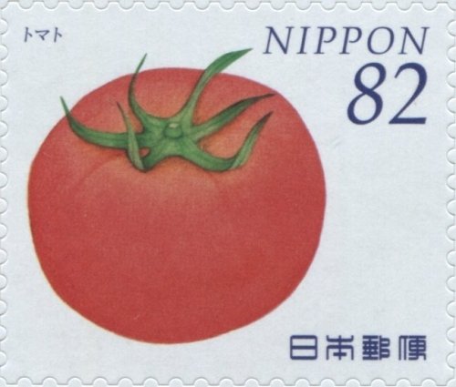 a 2014 Japanese stamp from a series on fruits and vegetables[id: a postage stamp with a detailed ill