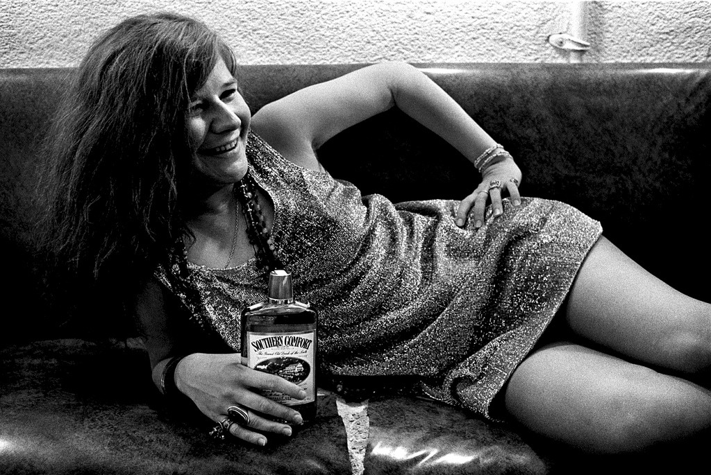 jubal666:Janis Joplin and her Southern Comfort backstage at Winterland Ballroom in