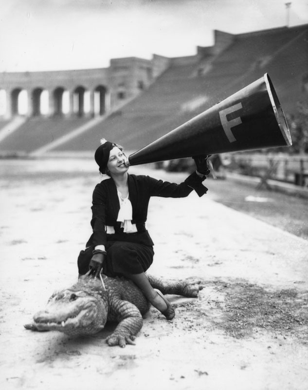 weirdvintage:  A woman riding an alligator in the Los Angeles Memorial Coliseum.