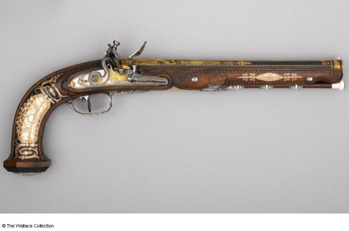 A gold decorated flintlock pistol crafted by Nicolas Noel Boutet of the Versailles Armory, early 19t