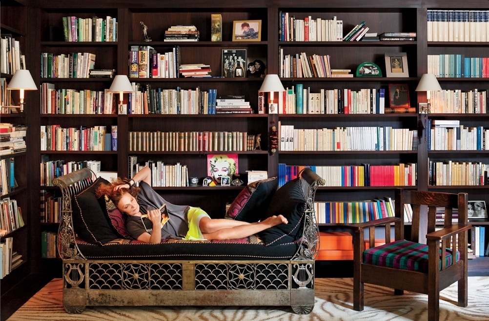 Diane Von Furstenberg proves that reading (and libraries) can be stylish AND sexy, and love the one-of-a-kind daybed to add an unexpected element to the clean lines of this interior.