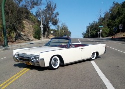 motomachina:  The MotoMachina 1961 Lincoln Continental. I had the car up on a rack the other day and noticed how bad the tire treads have gotten. Back in 2007 or so, I made the decision to run Coker BF Goodrich Bias Ply 950-14 with a 2.5&quot; White