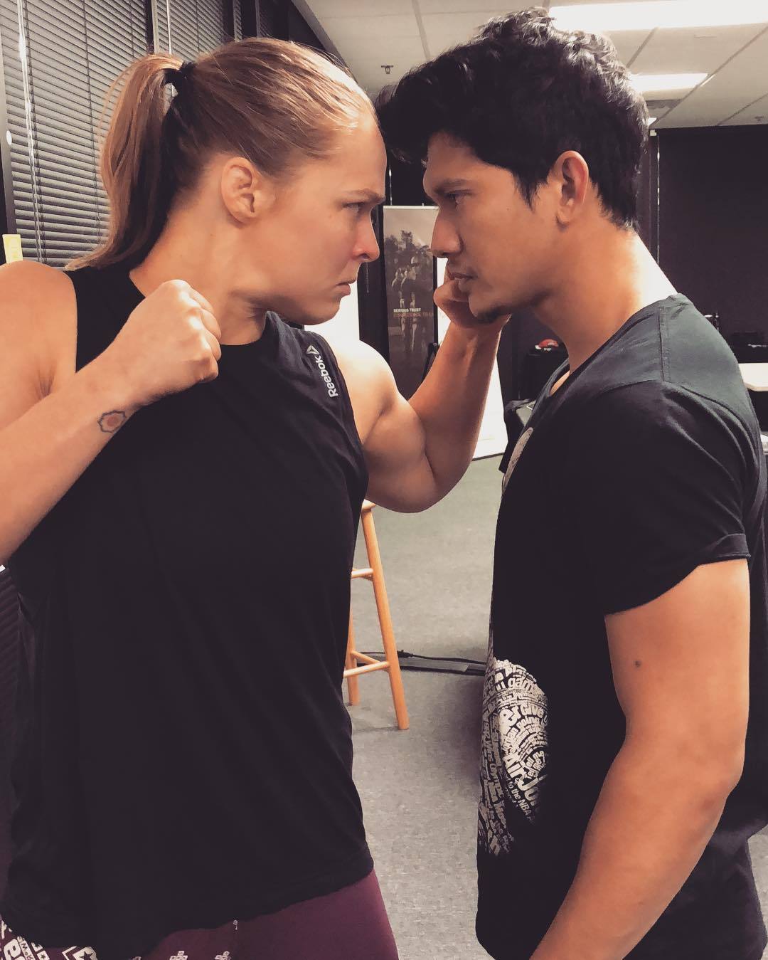 guts-and-uppercuts:  Ronda Rousey and Iko Uwais.I’m hoping this film is bananas.