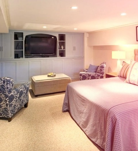 Master - BedroomLarge Elegant Master Light Wood Floor Bedroom Photo With White Walls, A Standard Fireplace