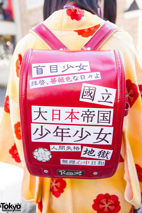 19-year-old Harajuku girl with twintails in floral kimono jacket over resale and handmade fashion wi