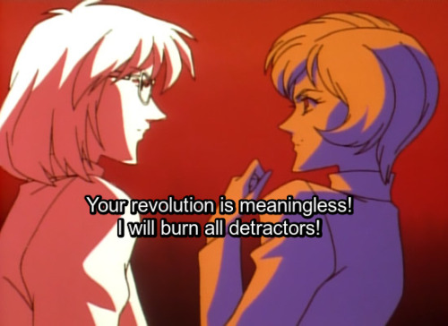 [Image: Nemuro and Tokiko staring at each other, bathed in the light of a fire. Text: Your revolutio