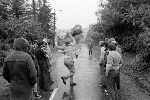 unearthedviews: IRELAND. County Leitrim. Drumkeeran Festival. Bale of Hay throwing competition. 1983   © Martin Parr/Magnum Photos  