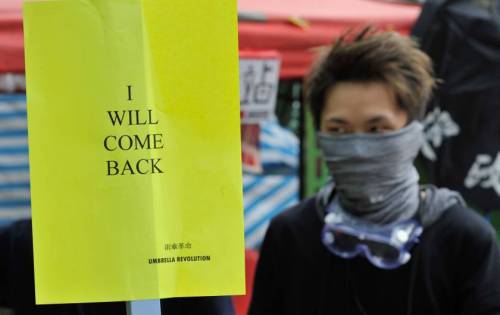 redrubied:  micdotcom:  Inspiring photos show the Hong Kong protesters’ parting gift to the government   Honk Kong’s democracy protests are over — for now.  Hong Kong police arrested pro-democracy activists and cleared out most of the protest