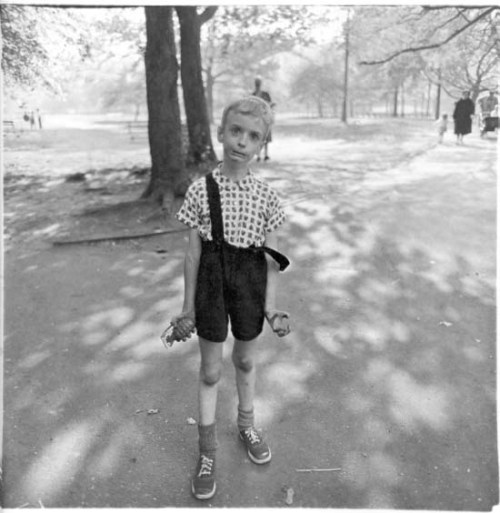 Child with toy hand grenade in Central Park by Diane Arbus