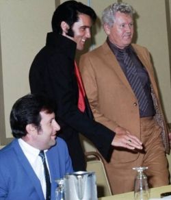 elvisandjerrylewislover:  Elvis Presley - Las Vegas - Press Conference - 1969 - First pic with his father Vernon Presley andhis friend Chalie Hodge - Elvis, so gorgeous and sexy. 