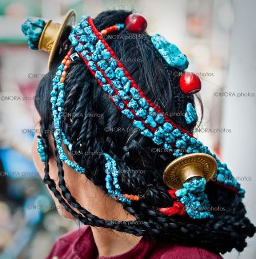 Women of Tibet (click to enlarge)8. Traditional turquoise jewelry, Lhasa, Tibet by Nora de Angelli