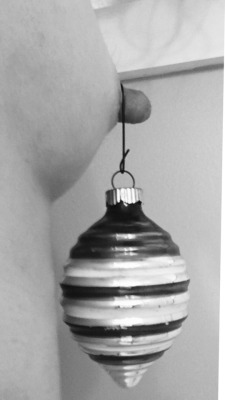 jjaatx:  redlovessexystuff:  Merry Christmas! My nipple is so thick I had to open the hook a bit to make it fit.  Perfection!