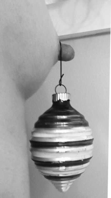 jjaatx:  redlovessexystuff:  Merry Christmas! My nipple is so thick I had to open the hook a bit to make it fit.  Perfection!