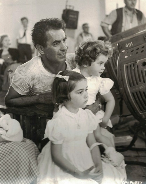 mylovelydeadfriends:Tyrone Power and his daughters on the set of Abandon Ship/Seven Waves Away, 1957