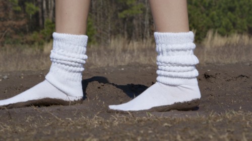 “Muddy Slouch Socks” is now available at www.seductivestudios.comIn this custom video, Roxy walks outside in the mud pits in her bright white slouch socks. She gradually gets them muddier and muddier, slopping around, and stepping in the wet, sticky