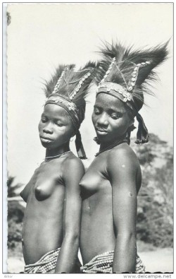   African women, via Delcampe.   