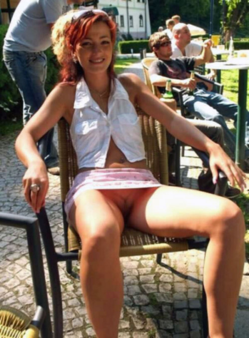 carelessnaked: No panties upskirt pic of sexy redhead wife flashing shaved pussy in public