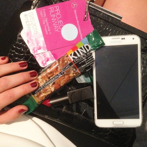 Today’s #nyfw essentials. @kindbars for gf sustenance, @narsissist lippie in Charlotte, phone,