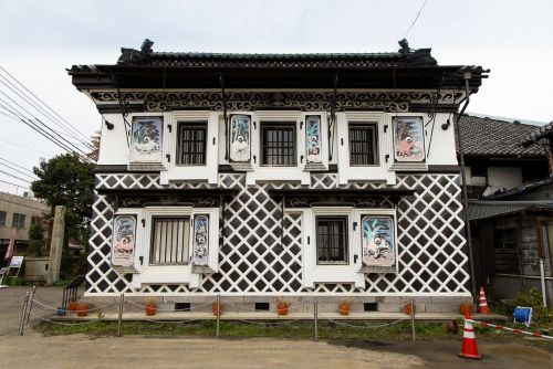 Plaster engravings called kote-e depicting Chinese zodiac animals and various other creatures decora