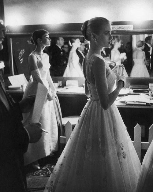 life: Audrey Hepburn and Grace Kelly waiting backstage at the RKO Pantages Theatre during the 28th A
