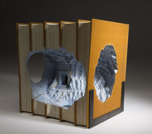 archiemcphee: Today the Department of Beguiling Book Art is catching up with the latest topographical book sculptures created by Montreal-based artist Guy Laramée (previously featured here). Laramée’s ability to carve detailed ice caves, mountains,