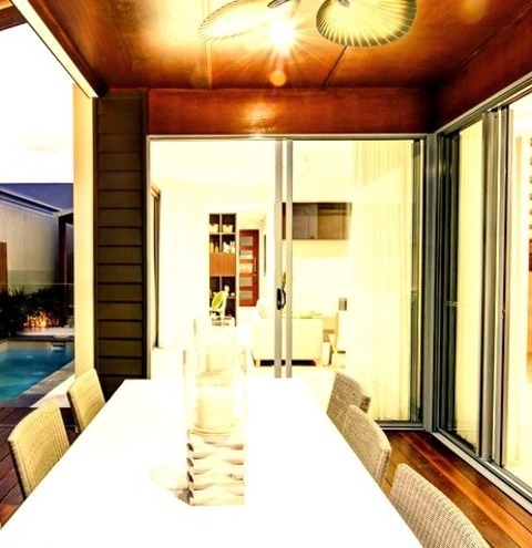 Beach Style Deck - Roof ExtensionsExample Of A Large Beach Style Backyard Water Fountain Deck Design