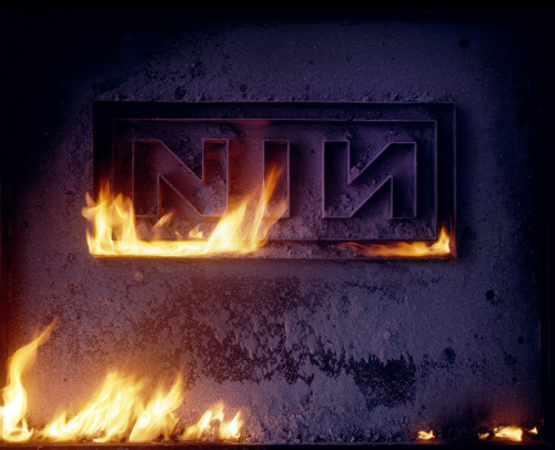 nineinchnails:Unused NIN logo art created by Russell Mills for The Downward Spiral, 1994.