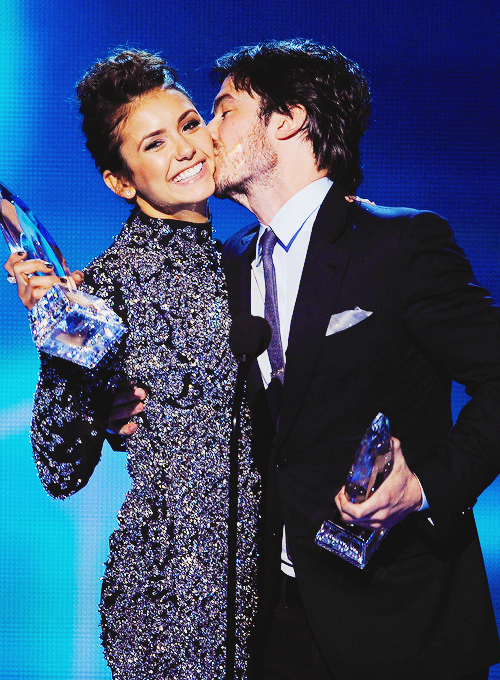 iansmolderholic:   Nina Dobrev and Ian Somerhalder, winners of the Favorite On Screen Chemistry award for ‘The Vampire Diaries,’ speak onstage at The 40th Annual People’s Choice Awards  