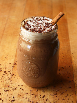 garden-of-vegan:  Mocha Smoothie (approx. &frac12; cup vanilla soy milk, &frac12; cup iced coffee cubes + coffee, 1.5 frozen bananas, &frac12; tbsp peanut butter, 1 tbsp cocoa, and vanilla) topped with foamy vanilla soy milk, chocolate shavings, and a