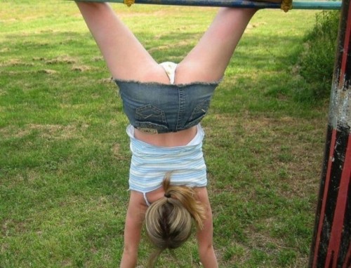 cdfantasy:  My daughter is always asking me to watch her do handstands.  She is really good at them.  But now that she is older, she wears the wrong clothing for them.  Doesn’t matter to me.  I could watch my baby girl do hand stands all day. 