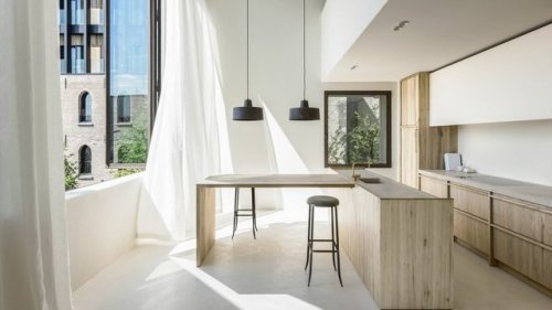 takeovertime: Cube Apartment | Arjaan De FeyterBuilt-in wooden units and sheer, full-height curtains
