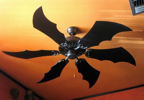 describedgoth:[ID: A photo of a ceiling fan with black blades that are shaped to look like bat wings