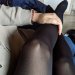 Relaxing with husband in tights at home.