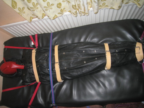 northernleather:A gimp restrained