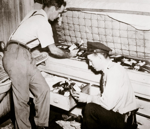 Stashed pints discovered by law enforcement on a ship during prohibition era search.Photo: Historica