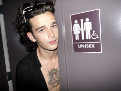 bradelterman:  I knew the moment that I saw this sign on the door that I had to get Matty to stop and pose here for a photo! So much fun you can have with bathroom door photos!  Photo by Brad Elterman