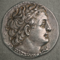 archaicwonder:  Tetradrachm of Ptolemy II, from Alexandria, Egypt, C. 285-246 BCObverse: Diademed head of  Ptolemy I to right, wearing aegis around his neck; behind head, Β. Reverse: ΠΤΟΛΕΜΑΙΟΥ ΣΩΤΗΡΟΣ Eagle, with closed wings, standing