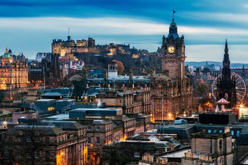 Beautiful shot of Edinburgh City Centre at sunset, with Edinburgh Castle towering above the rest of 
