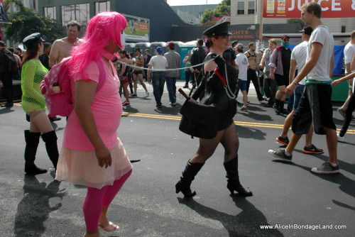 mistressaliceinbondageland:  Taking my sissy for  a walk during the Folsom Street Fair in San Francisco, California. Epic public crossdressing humiliation plus bondage!!! http://www.aliceinbondageland.com 