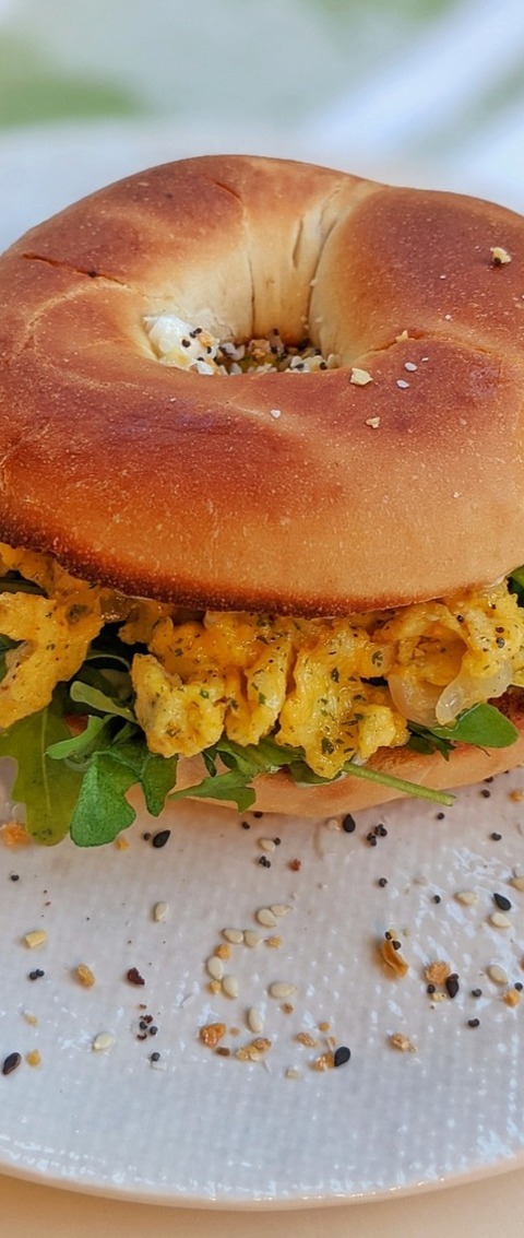 Bagel Sandwich With Scrambled Eggs And Arugula Recipe