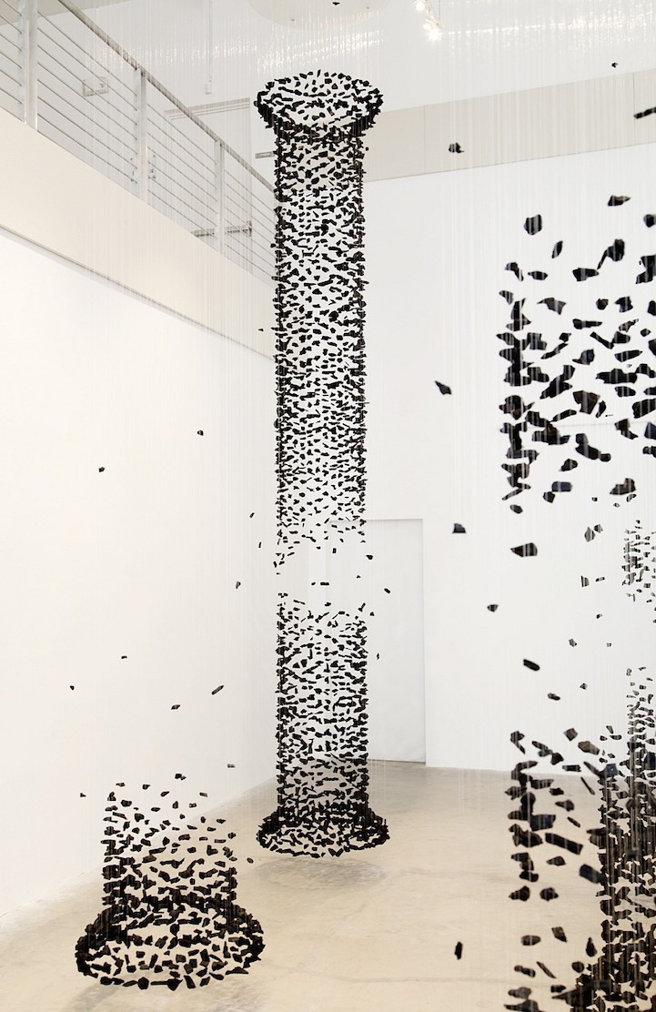 jedavu:  Columns of Suspended Charcoal Explore Relationship Between Nature and Man