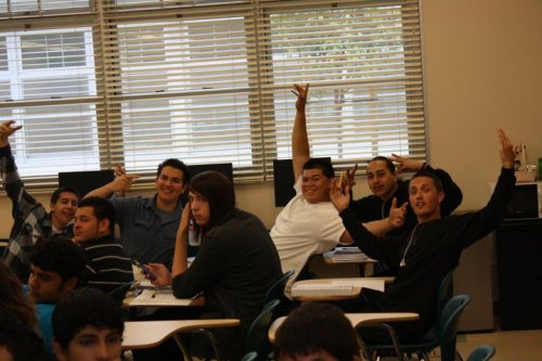 drug-clinic:  SO I LOOK IN THE YEARBOOK AND MY FRIEND IS SURROUNDED BY ALL THESE CHOLOS AND HIS FACE IS JUST PRICELESS OH MY GOD 