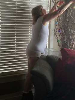 allmymilf:  2018.03.18, Hanging some Easter Eggs on the branches for some decorations. Notice my toys in the foreground ready for our playtime. My man bought this huge strap-on Dildo for me. He is a little small in the cock department but he makes up