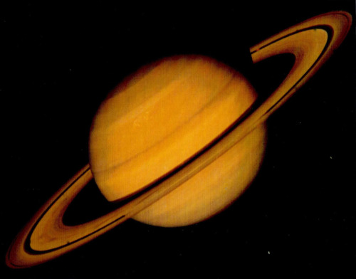 nocombatjustwombats:humanoidhistory:35 YEARS AGO TODAY: Planet Saturn, along with moons Rhea and Dio