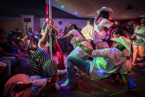 Photo: Delacroix-Like DancePhotographer caption: A group of cowboys takes to the dance floor at Club