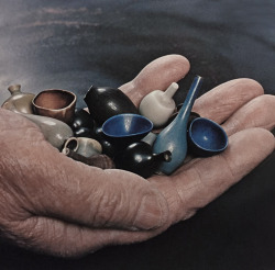 scandinaviancollectors: BERNDT FRIBERG, Friberg holding a group of his handmade miniature stoneware vessels, made for Gustavsberg Ab, Sweden, early 1960s.